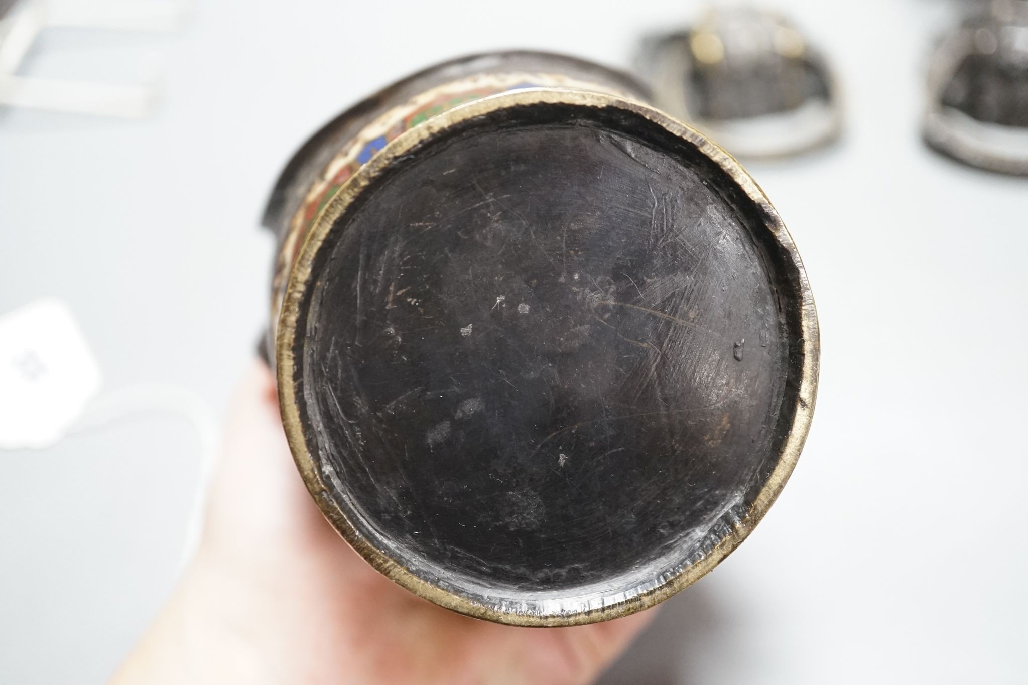 A pair of Chinese cast brass mask ring handles and a pair of Japanese enamelled bronze vases, 15 cm